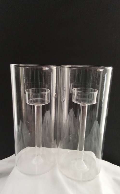 Two glass candle holders