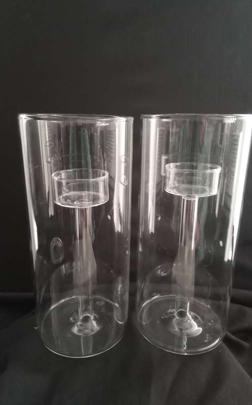 Two glass candle holders