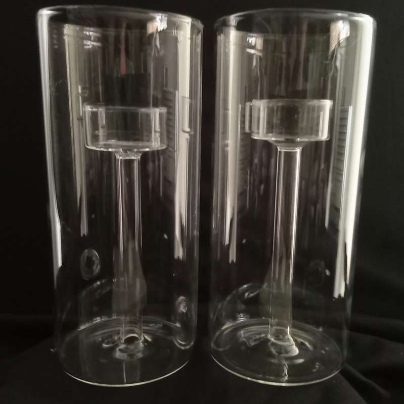 Two glass candle holders