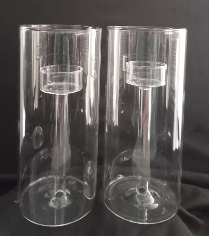 Two glass candle holders