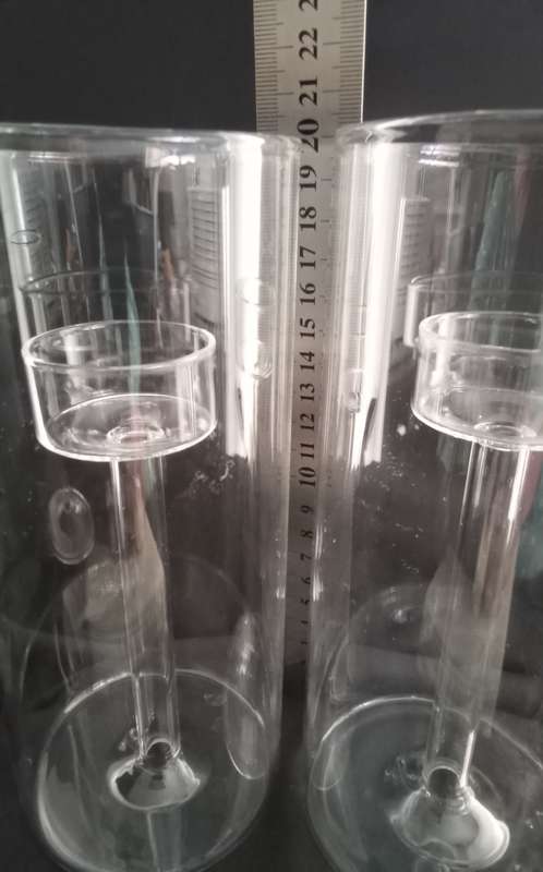 Two glass candle holders