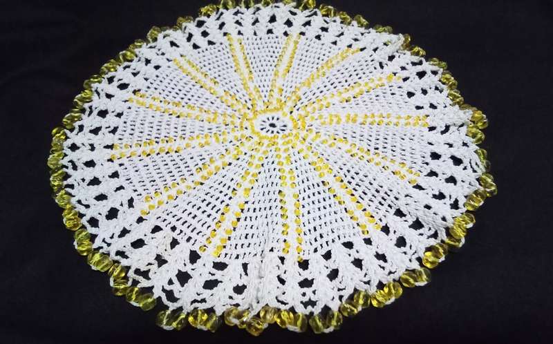 Beautiful beaded hand crocheted doily/jug cover - about 19cms across