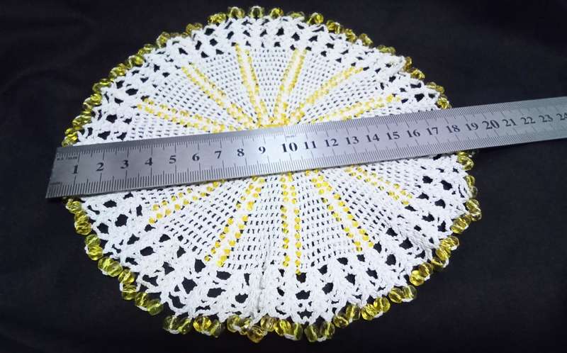 Beautiful beaded hand crocheted doily/jug cover - about 19cms across