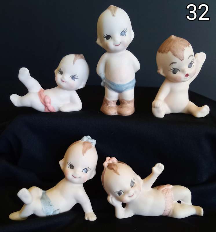 Beautiful set of 5 hand painted porcelain kewpies