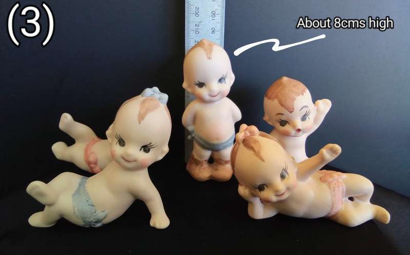 Beautiful set of 5 hand painted porcelain kewpies