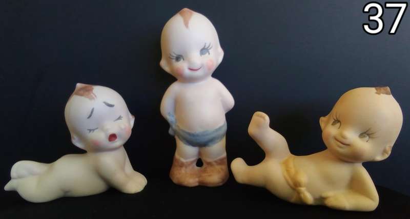 Beautiful set of 3 hand painted porcelain kewpies