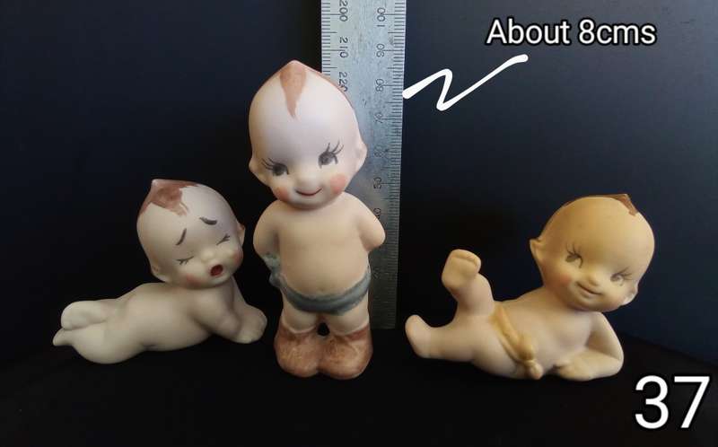 Beautiful set of 3 hand painted porcelain kewpies