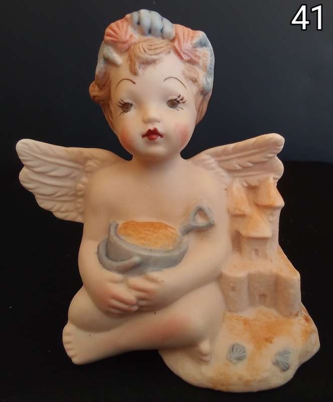 Beautiful  hand painted porcelain Angel with blue beach bucket