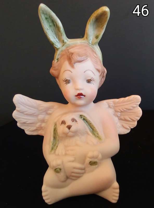 Beautiful hand painted porcelain Angel with bunny ears
