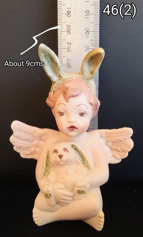 Beautiful hand painted porcelain Angel with bunny ears