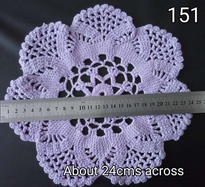 Beautiful light purple crocheted doily - about 24cms across