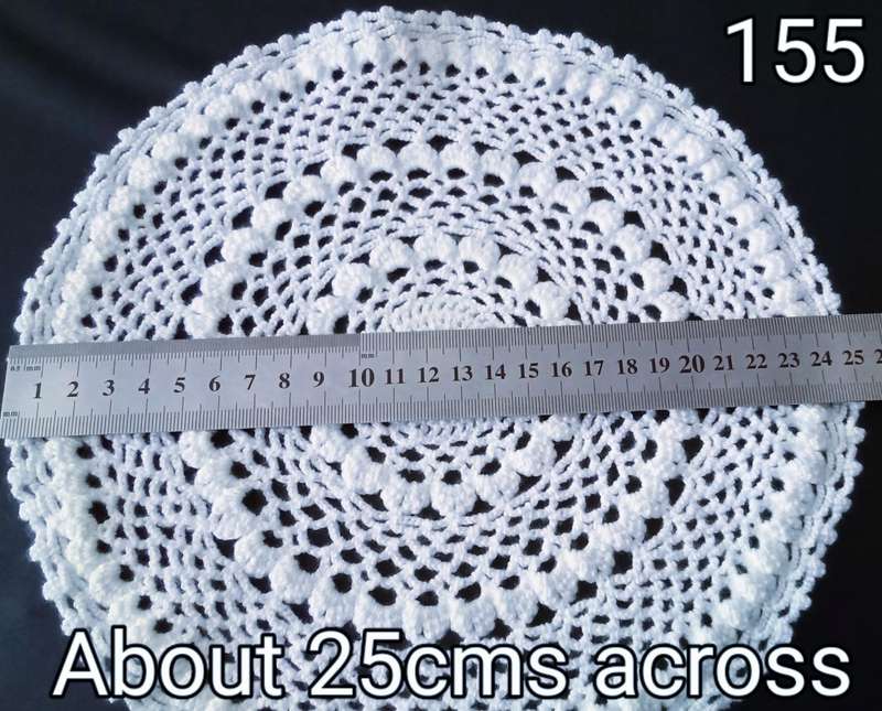 Stunning white crocheted doily - about 25cms across