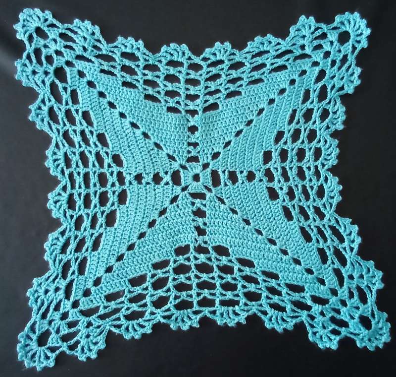 Stunning turquoise crocheted doily - about 28cms across