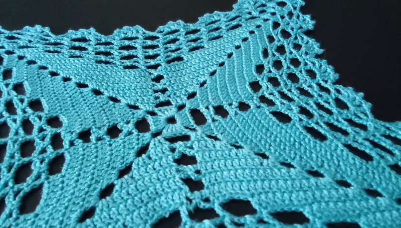 Stunning turquoise crocheted doily - about 28cms across