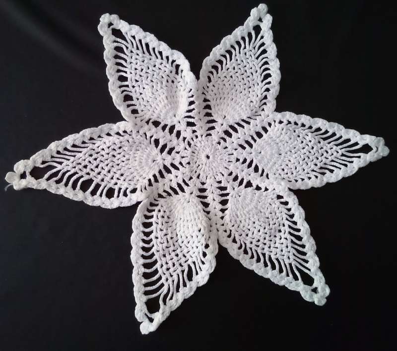 Lovely white crocheted doily - about 32cms across