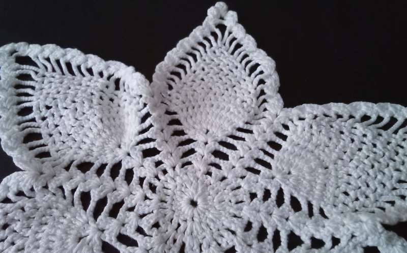 Lovely white crocheted doily - about 32cms across