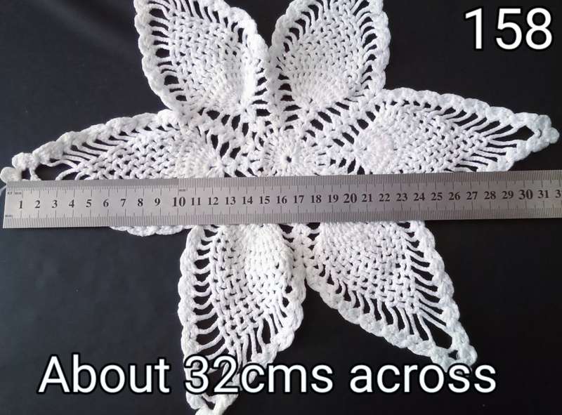 Lovely white crocheted doily - about 32cms across