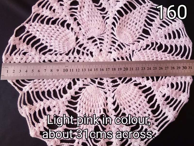 Lovely soft pink crocheted doily - about 31cms across