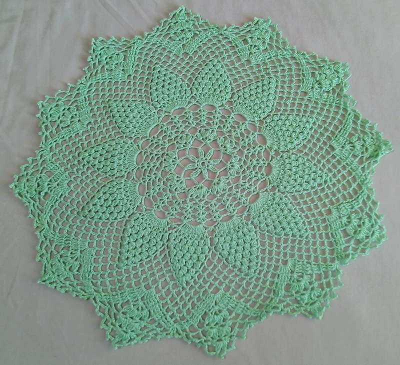 Beautiful green crocheted doily - about 46cms across