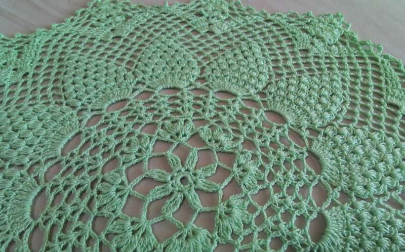 Beautiful green crocheted doily - about 46cms across