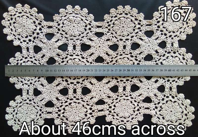 Beautiful detailed beige crocheted doily - about 46cms across