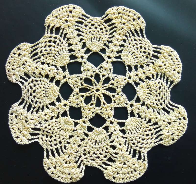 Beautiful soft yellow crocheted doily - about 19cms across
