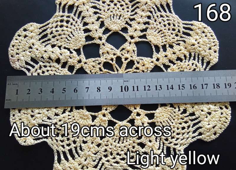 Beautiful soft yellow crocheted doily - about 19cms across