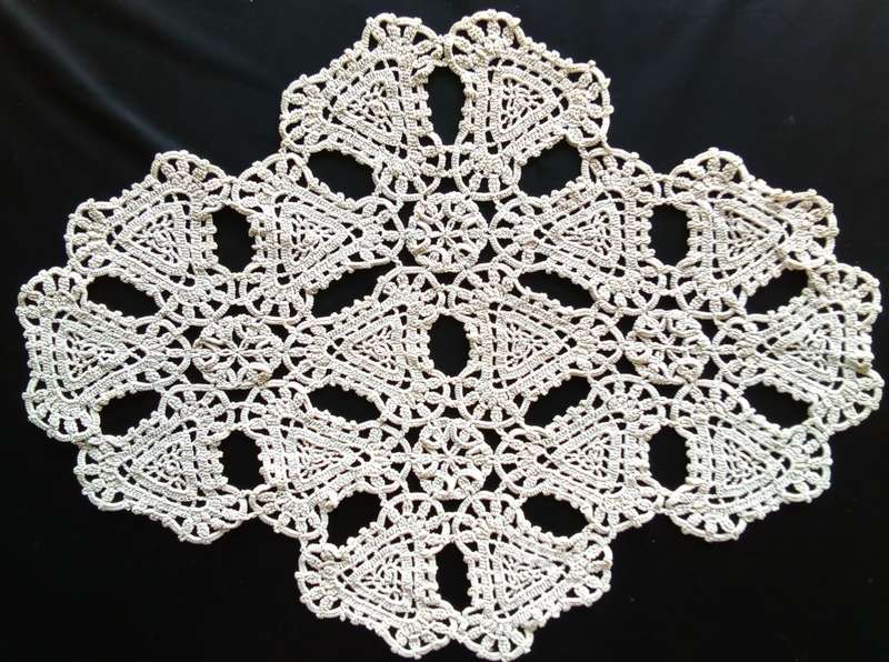 Beautiful beige crocheted doily - about 46cms across