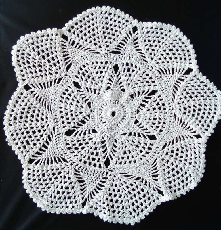 Beautiful white crocheted doily - about 40cms across