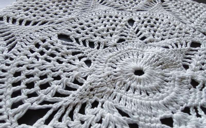Beautiful white crocheted doily - about 40cms across