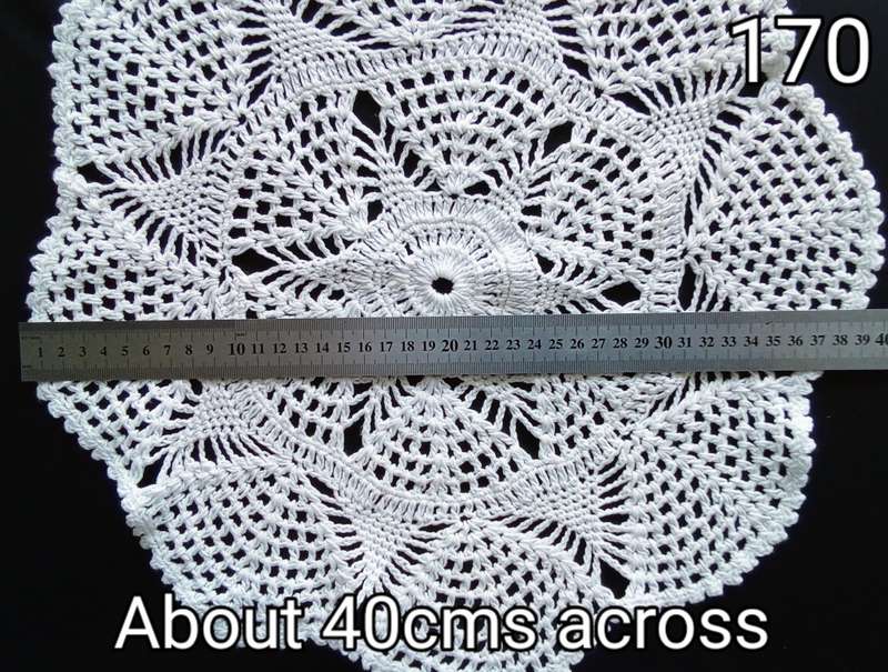 Beautiful white crocheted doily - about 40cms across
