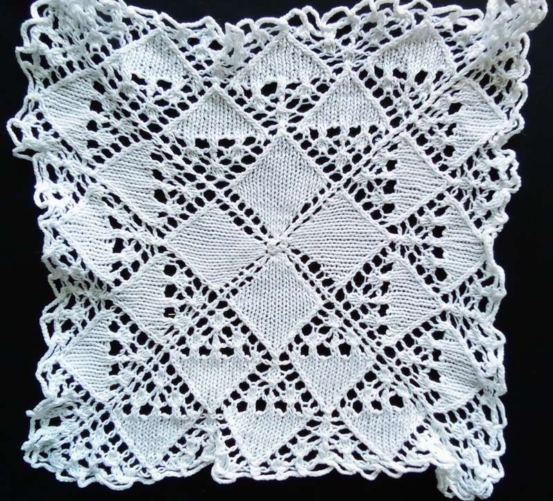 Beautiful white crocheted doily - 22cms across