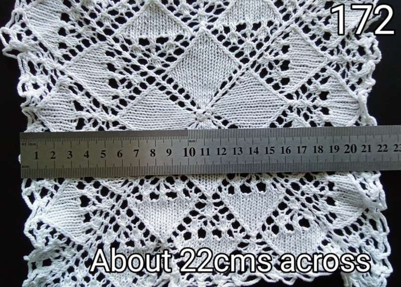 Beautiful white crocheted doily - 22cms across