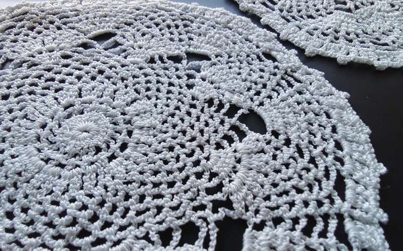 Two Beautiful white crocheted doilies - 20cms across