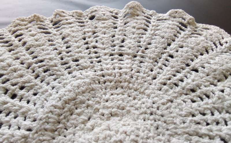 Lovely beige crocheted doily - 30cms across