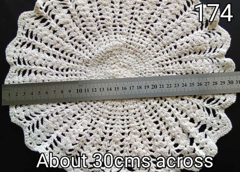 Lovely beige crocheted doily - 30cms across