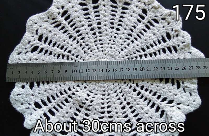 Lovely off-white crocheted doily - 30cms across