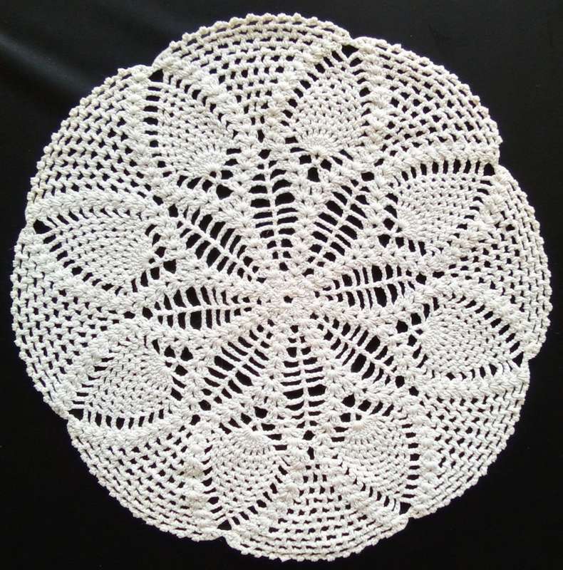 Lovely off-white crocheted doily - 26cms across