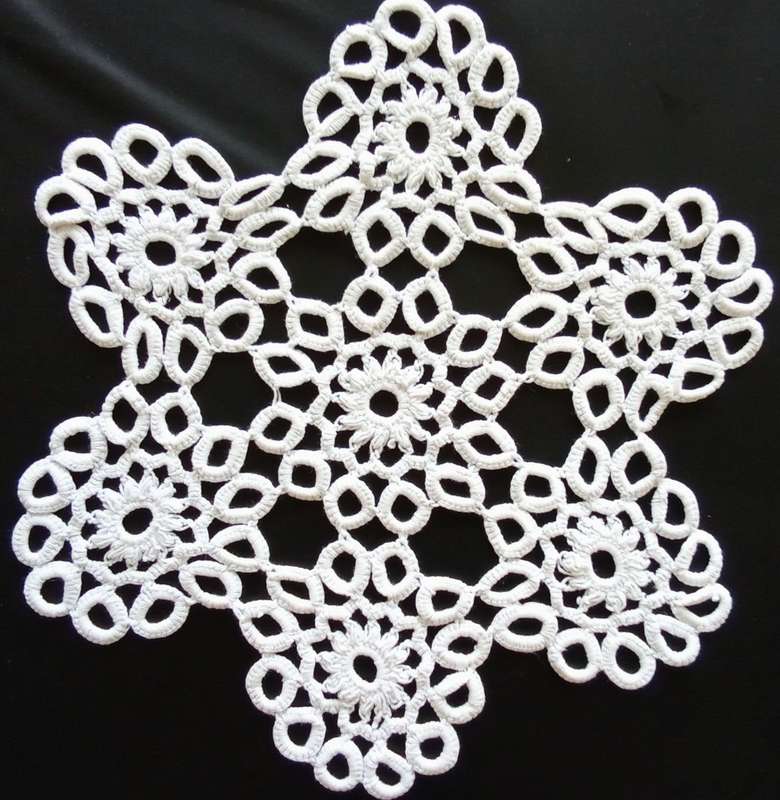 Lovely white crocheted doily - 30cms across