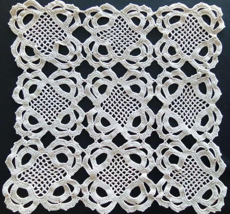 Lovely detailed beige crocheted doily - 32cms across