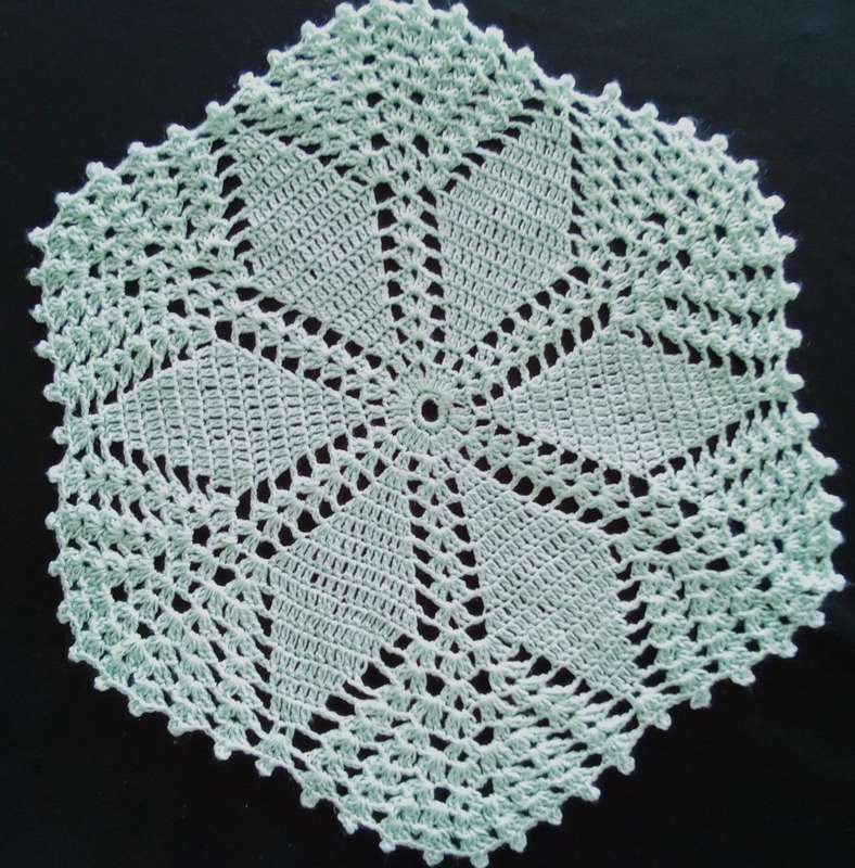 Very pretty peppermint green crocheted doily - 30cms across