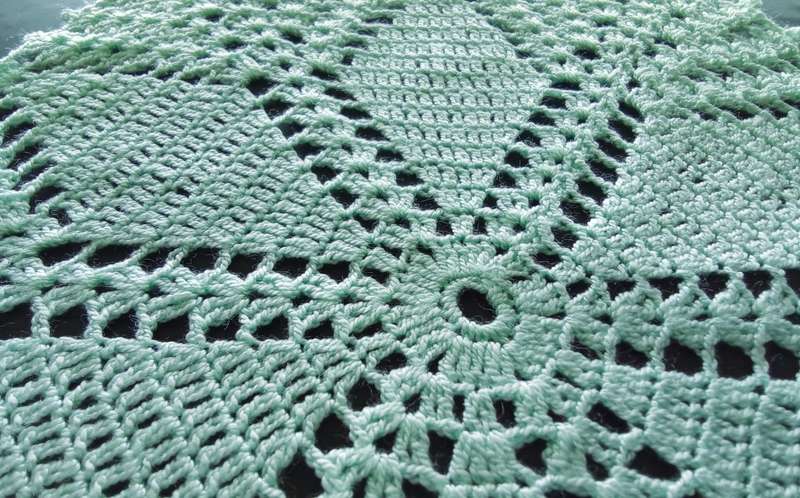 Very pretty peppermint green crocheted doily - 30cms across