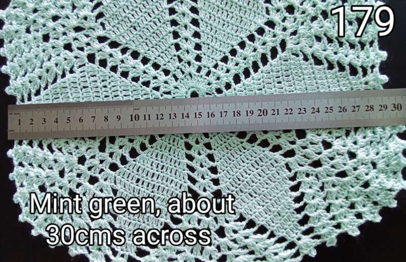Very pretty peppermint green crocheted doily - 30cms across
