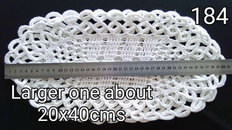 A pair of similar pretty vintage doilies  - 40cms across