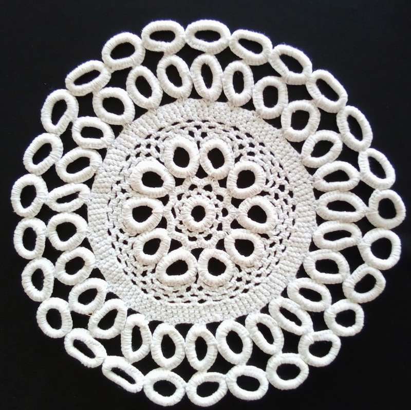 Lot of three lovely vintage doilies 23cms across