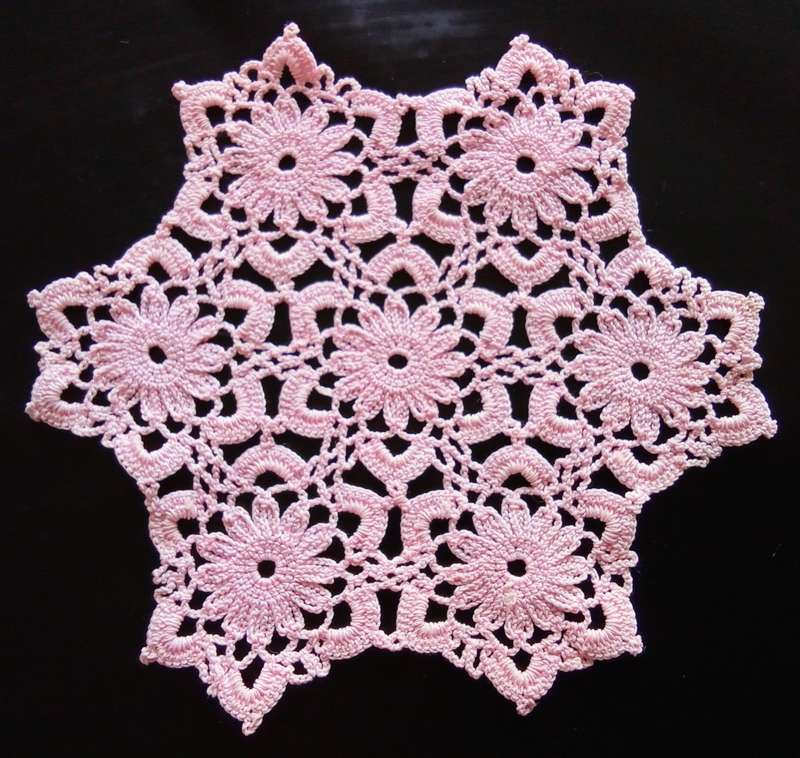 Fine small pink vintage crocheted doily