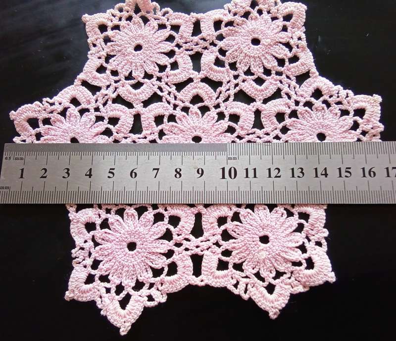 Fine small pink vintage crocheted doily