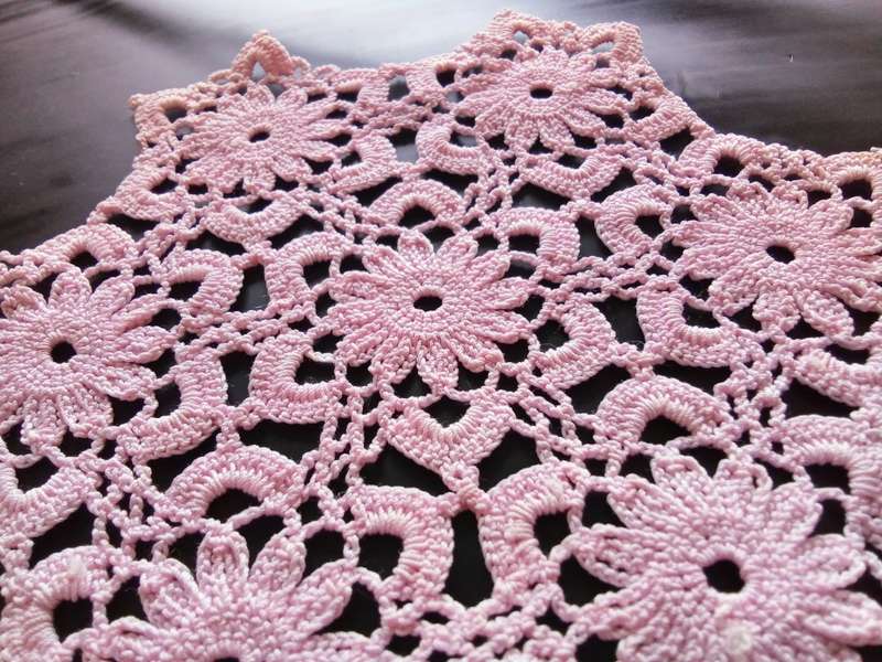 Fine small pink vintage crocheted doily