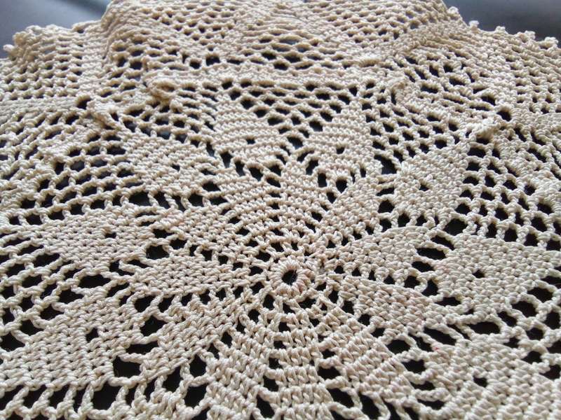 Fine beige vintage crocheted doily
