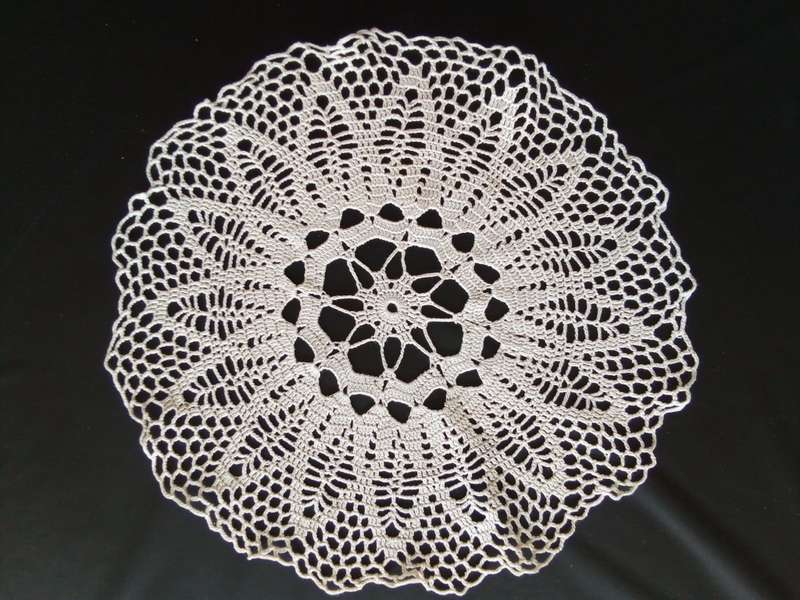 Pretty beige vintage crocheted doily